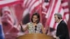 First lady Michelle Obama looks over the podium during a sound check at the Democratic National Convention in Charlotte, North Carolina, September 3, 2012.