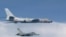 This photo taken July 22, 2017, by Taiwan's Defense Ministry shows a Taiwanese jet intercepting an H-6 bomber from China over the East China Sea, part of the Pacific and home to small islands whose ownership is disputed by China, Japan and Taiwan.