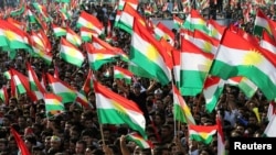 Kurds celebrate to show their support for the upcoming Sept. 25 independence referendum in Irbil, Iraq September 22, 2017.