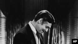 Clark Gable and Vivien Leigh star in the 1939 classic, "Gone With the Wind" that HBO Max has temporarily removed from its streaming library in order to add historical context to the film long criticized for romanticizing slavery and the Civil War era.