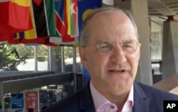 In this screen grab taken from video provided by The Associated Press, WHO Deputy Director-General of Emergency Preparedness and Response Dr Peter Salama speaks about Congo's Ebola outbreak, at the WHO Headquarters, in Geneva, Switzerland, May 17, 2018.