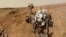 NASA's Mars rover Curiosity is pictured in this February 3, 2013 handout self-portrait obtained by Reuters February 9, 2013. The image was made by combining dozens of exposures taken by the rover's Mars Hand Lens Imager (MAHLI). The rover is positioned at