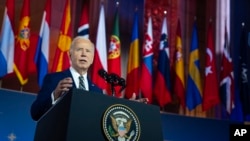 President Joe Biden delivers remarks on the 75th anniversary of NATO at the Andrew W. Mellon Auditorium, July 9, 2024, in Washington. 
