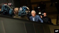 European Union chief Brexit negotiator Michel Barnier on his way to a meeting at the Europa building in Brussels, Oct. 11, 2019.