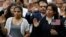 FILE - Immigrants take the citizenship oath during naturalization ceremonies at a U.S. Citizenship and Immigration Services ceremony in Los Angeles, California, Sept. 20, 2017. In the 2019 fiscal year, the U.S. will limit refugee admissions to 30,000.