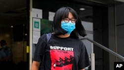 FILE - Chow Hang Tung, vice chairperson of the Hong Kong Alliance in Support of the Democratic Patriotic Movements of China, leaves a police station in Hong Kong, June 5, 2021. 