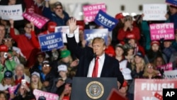 President Donald Trump speaks during a rally, Oct. 24, 2018, in Mosinee, Wis. 