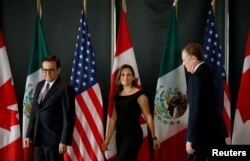 From left, Mexico's Economy Minister Ildefonso Guajardo, Canada's Foreign Minister Chrystia Freeland and U.S. Trade Representative Robert Lighthizer.