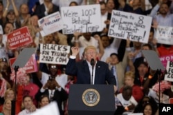 President Donald Trump speaks during a campaign rally in Melbourne, Florida, Feb. 18, 2017.