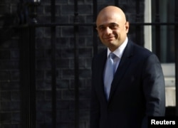 Britain's Home Secretary Sajid Javid arrives in Downing Street in London, May 1, 2018.