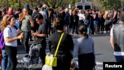 People wait in line to donate blood outside LaReina High School after a mass shooting by a lone gunman at a bar in Thousand Oaks, Calif., Nov. 8, 2018.