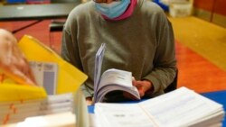 Bergen County mail-in ballots are processed in Hackensack, N.J., Nov. 3, 2021. Democratic Gov. Phil Murphy and Republican Jack Ciattarelli were locked in what amounted to a tie in New Jersey, a state where Democrats posted victories in recent years.