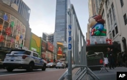 Crowd barriers are in place around Macy's as preparations continue for the Macy's Thanksgiving Day Parade in New York, Nov. 23, 2016, More than 80 New York City sanitation trucks filled with sand will be used along the route to create a physical barrier along the route.