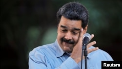 Venezuela's President Nicolas Maduro attends a gathering in support of his government in Caracas, Venezuela, Feb. 7, 2019.
