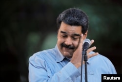 Venezuela's President Nicolas Maduro attends a gathering in support of his government in Caracas, Venezuela, Feb. 7, 2019.