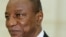 FILE - Guinea's President Alpha Conde