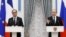 FILE - Russian President Vladimir Putin and French President Francois Hollande attend news conference after meeting at Kremlin, Moscow, Nov. 26, 2015.
