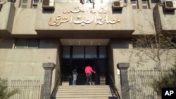 People enter Cairo, Egypt's central morgue where the body of Giulio Regeni, A 28-year-old graduate student, is held, Feb. 4, 2016.
