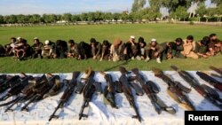 Бойовики ІДІЛ, які здалися афганському уряду, представлені ЗМІ в Джелалабаді, провінція Нангархар, Афганістан, 17 листопада 2019 року. REUTERS