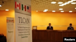 A NAFTA banner is seen at a hotel where the seventh round of NAFTA talks involving the United States, Mexico and Canada takes place, in Mexico City, Feb. 26, 2018. 