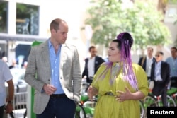 Britain's Prince William meets the 2018 Eurovision winner Netta Barzilai during a visit to Tel Aviv, Israel, June 27, 2018.