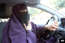 FILE – A ban on veils is one issue addressed by the UDMF party.