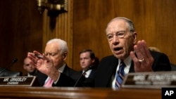 Senate Judiciary Chairman Chuck Grassley, R-Iowa., talks during a Senate Judiciary Committee hearing with Christine Blasey Ford, Sept. 27, 2018, on Capitol Hill in Washington.