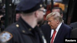 Former U.S. President Donald Trump arrives at Trump Tower, after his indictment by a Manhattan grand jury following a probe into hush money paid to porn star Stormy Daniels, in New York City, April 3, 2023. 