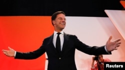 Dutch Prime Minister Mark Rutte of the VVD Liberal party appears before his supporters in The Hague, Netherlands, March 15, 2017. Rutte is poised for a third term. 