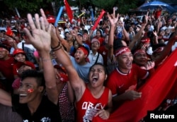 Supporters of Myanmar's pro-democracy figurehead Aung San Suu Kyi gather outside National League for Democracy headquarters (NLD) in Yangon, Myanmar, Nov. 9, 2015.