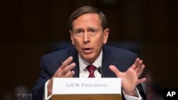 FILE - Former CIA Director David Petraeus testifies on Capitol Hill in Washington, Sept. 22, 2015. Earlier in the search he was considered a leading contender to become the Trump administration's top diplomat.