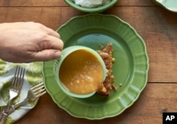 This October 2016 photo shows salted caramel sauce in New York. This dish is from a recipe by Katie Workman (Katie Workman via AP)