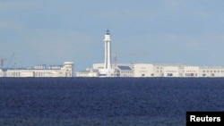 FILE - Chinese structures are pictured on the disputed Spratly Islands in the South China Sea, April 21, 2017. 