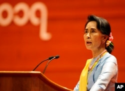 FILE - Myanmar's State Counsellor Aung San Suu Kyi speaks during the opening ceremony of the second session of the 21st Century Panglong Union Peace Conference at the Myanmar International Convention Centre in Naypyitaw, Myanmar, May 24, 2017.