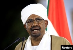 FILE PHOTO: Sudanese President Omar al-Bashir delivers a speech at the Presidential Palace in Khartoum, Feb. 22, 2019.
