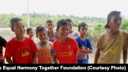 Acehnese boys visiting Aceh Utara camp.