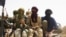 Fighters from the Islamist group Ansar Dine outside Timbuktu (file photo).