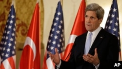 U.S. Secretary of State John Kerry speaks during a news conference with Turkish Foreign Minister Ahmet Davutoglu, not pictured, in Ankara, Friday, March 1, 2013. 