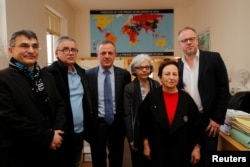 Reza Moini, head of RSF’s Iran/Afghanistan desk, Taghi Rahmani, Iraj Mesdaghi, Monireh Baradaran,Shirin Ebadi and Christophe Deloire, director of RSF during a news conference on Iran at the RSF offices in Paris, Feb. 7, 2019.