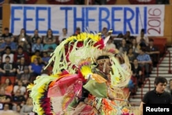 FILE - A group of Native American pow-wow dancers perform before a campaign rally with U.S. Democratic presidential candidate Bernie Sanders in Oklahoma City, Oklahoma, Feb. 28, 2016.