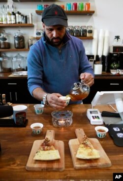 Ibrahim Alhasbani is like generations of Middle Eastern immigrants in the Detroit suburb of Dearborn: He fled war, came with dreams and worked for others until he could strike out on his own. Now he sees a long-term future outside the country he left and