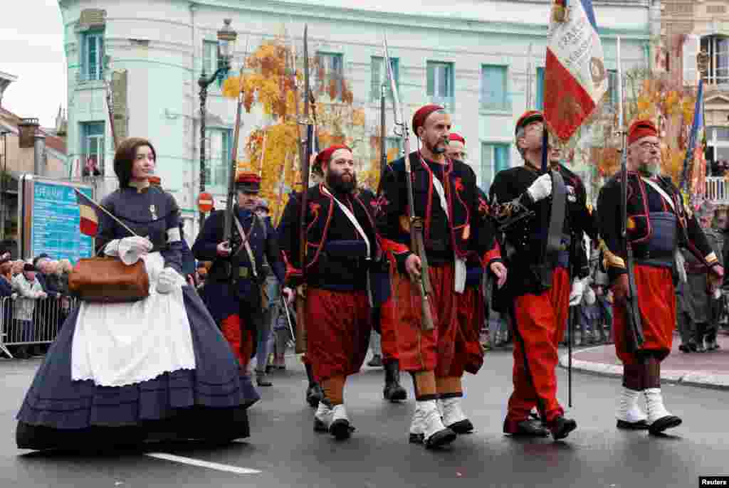 History enthusiasts dressed as Zouave soldiers attend a commemoration ceremony for Armistice Day, 100 years after the end of World War One, in Epernay, France, Nov. 11, 2018.