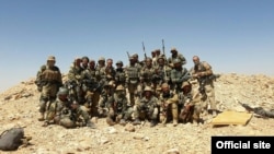 FILE - A photo published by the Security Service of Ukraine purports to show Wagner Group mercenaries at an unidentified location. (ssu.gov.ua)