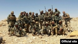 FILE - A photo published by the Security Service of Ukraine purports to show Wagner Group mercenaries at an unidentified location.