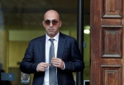 Maltese businessman Yorgen Fenech, who was arrested in connection with an investigation into the murder of journalist Daphne Caruana Galizia, leaves the Courts of Justice in Valletta, Malta, Nov. 29, 2019.