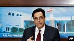 FILE - Lebanese Prime Minister Hassan Diab speaks during a news conference at the Presidential Palace in Baabda, east of Beirut, Lebanon, Jan. 21, 2020.
