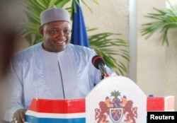 FILE - Gambia's President Adama Barrow holds a news conference in his residence in Banjul, Jan. 28, 2017.