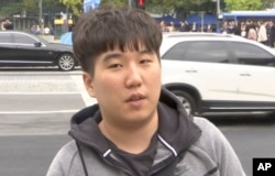 Ock Hyun-woong is interviewed by the Associated Press, Oct. 30, 2017, about President Donald Trump's visit to Asia in Seoul, South Korea.