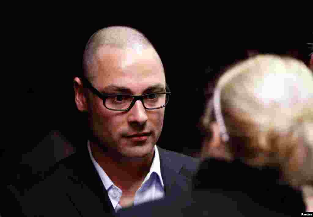 Carl Pistorius, brother of Oscar, attends his brother's court appearance in Pretoria February 15, 2013. 