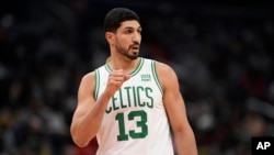 FILE - Boston Celtics center Enes Kanter looks on during an NBA basketball game against the Washington Wizards, in Washington, Oct. 30, 2021.